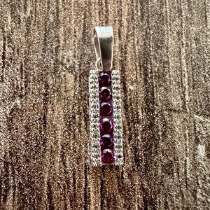 14 kt white gold purple diamond pendant